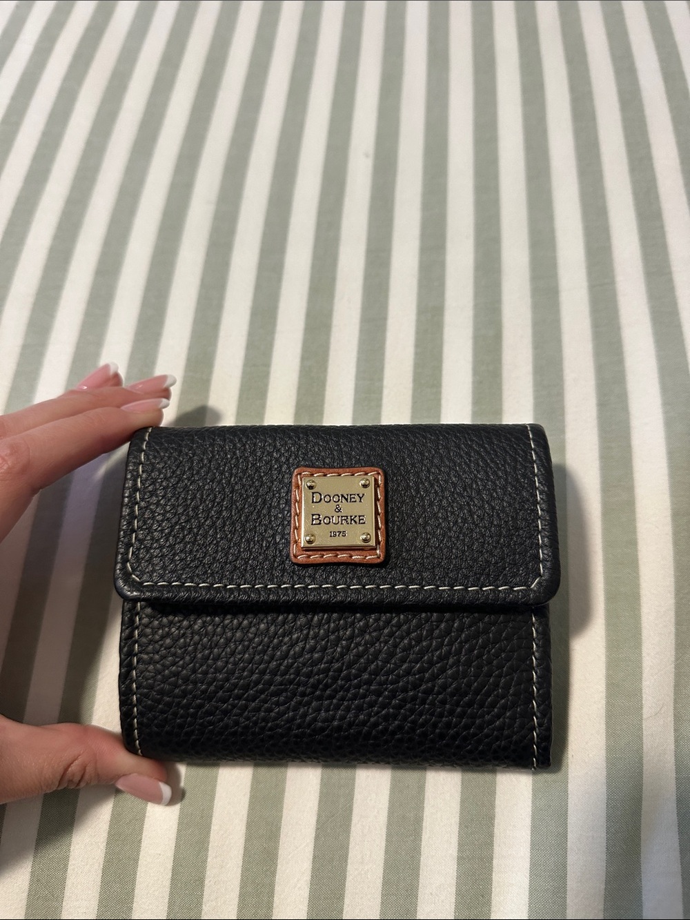 Dooney & Bourke Black Pebbled Leather Trifold Wallet with Brass Plaque
